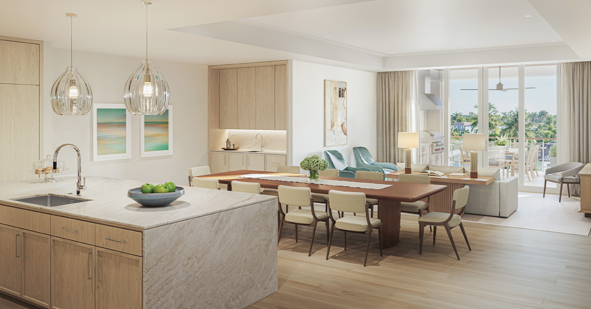 Open-concept living space with kitchen island and dining area.