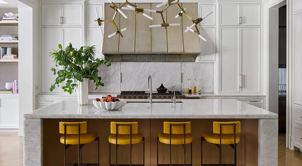 Modern coastal kitchen with island seating in a Naples waterfront condominium