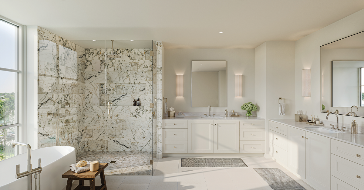 Primary bathroom with marble shower, freestanding tub, and double vanity.