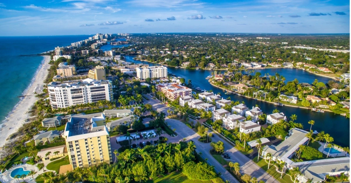 Aerial panorama of Naples waterfront along Gulf Shore Boulevard