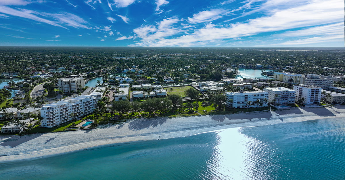 Aerial view of beachfront buildings and coastline
